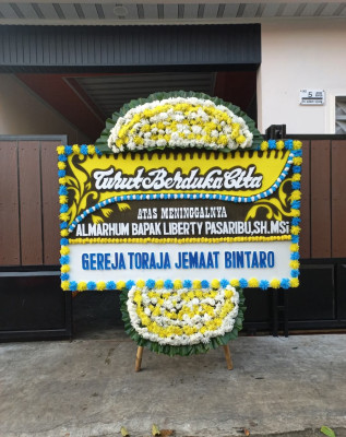 Papan Bunga Duka di Rumbio Jaya